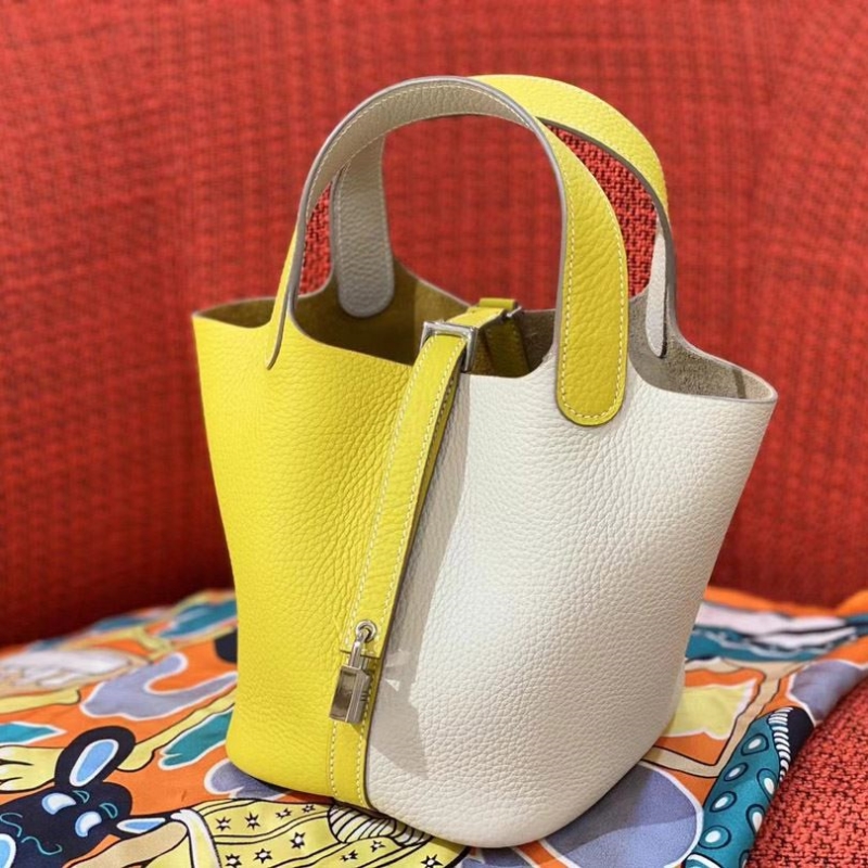 H**mes shopping bags